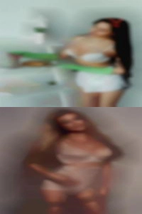 Nude Comstock Park, Michigan girls in bed with leg open