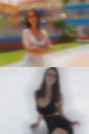 Tribal women check webcam hang